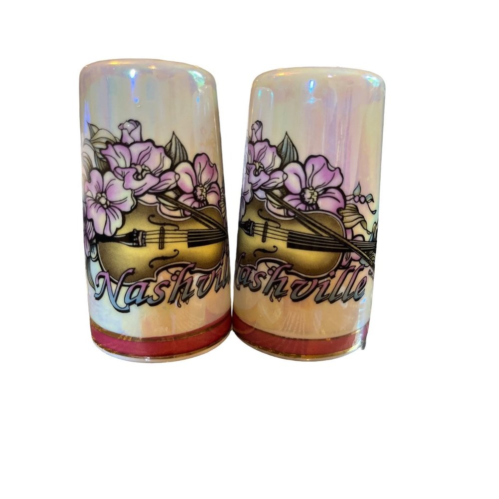 New/unused NASHVILLE Salt and a pepper shakers with flowers and guitar 3” tall